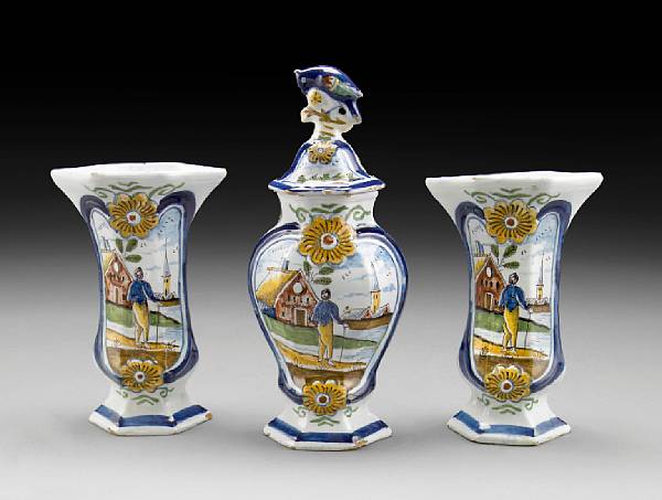 Appraisal: A set of three Dutch Delft polychrome decorated vases De