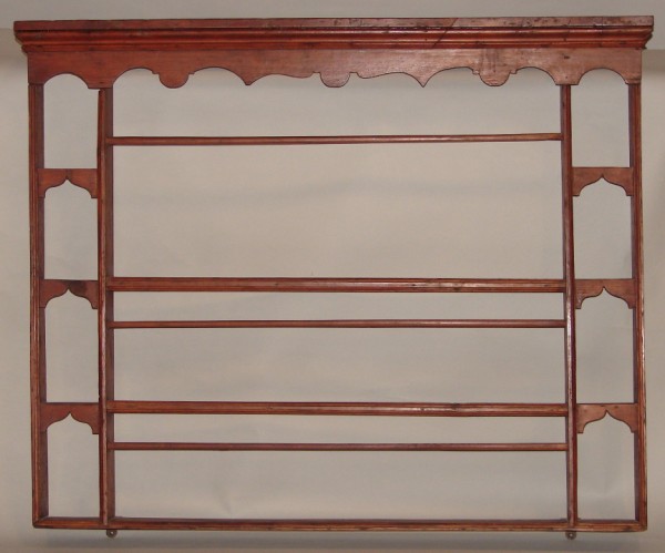 Appraisal: Pine red wash three center shelves - - flanked by