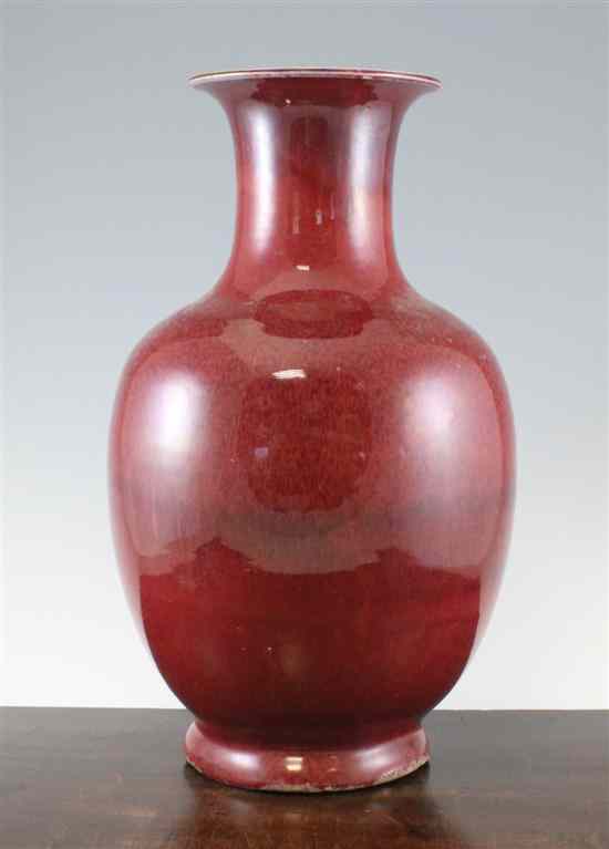 Appraisal: A large Chinese flambe glazed ovoid vase with trumpet shaped