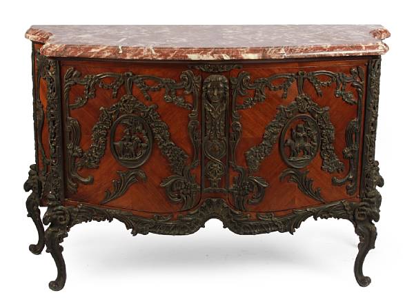 Appraisal: A Louis XV style bronze mounted buffet with marble top