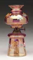 Appraisal: IRIDIZED MINI LAMP Unlisted Clear glass with a purple to