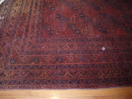 Appraisal: A Turkoman main carpet early th century the red field