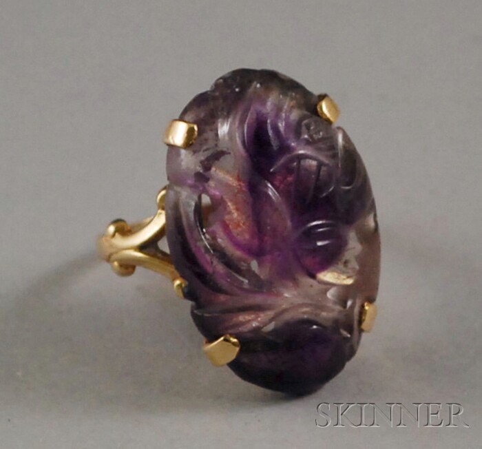 Appraisal: kt Gold and Amethyst Ring the amethyst carved in the