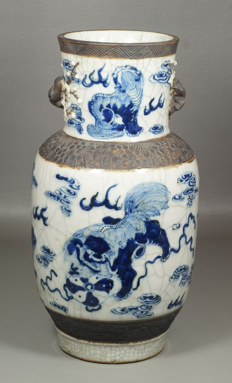 Appraisal: Chinese crackle glaze blue and white vase with foo dog