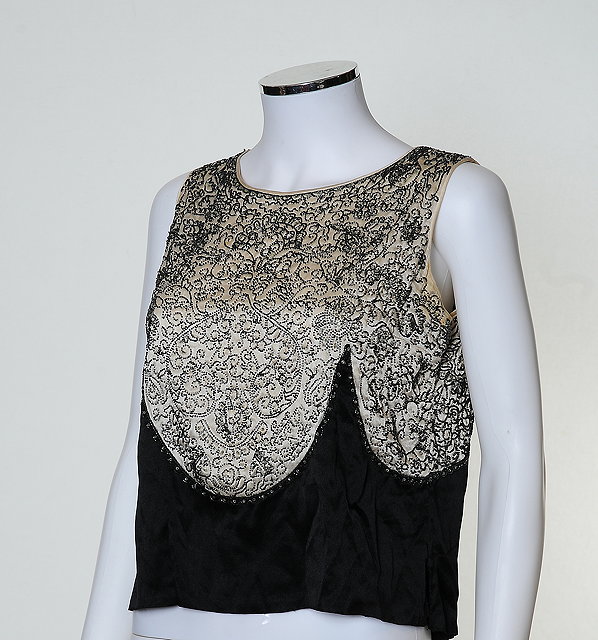 Appraisal: A s s elaboratly beaded handmade sleevless top black and