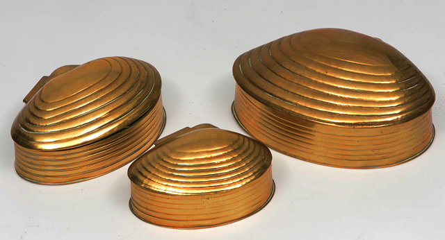 Appraisal: A GRADUATED SET OF THREE BRASS BOXES in the form