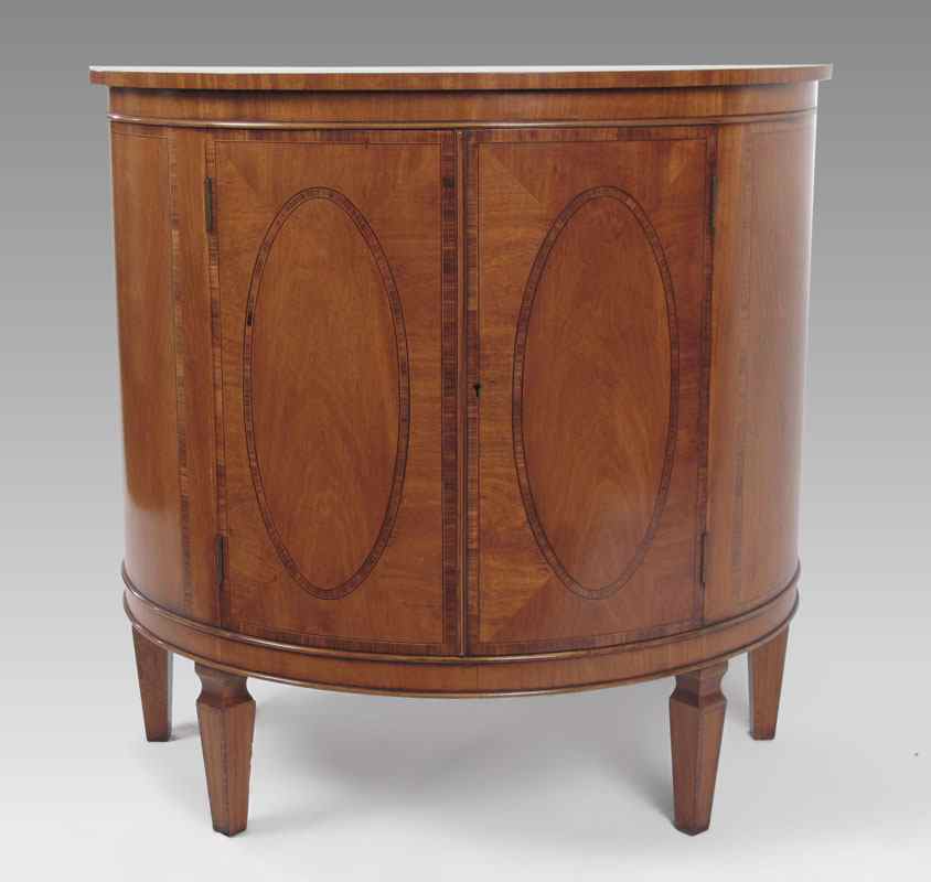 Appraisal: ITALIAN STYLE DEMI-LUNE COMMODE Banded inlay two door cabinet on