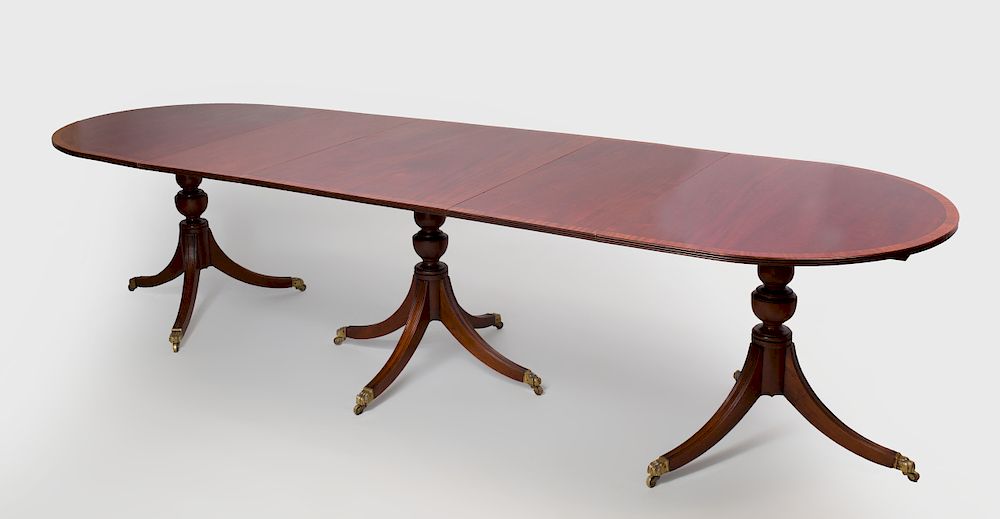 Appraisal: George III Style Inlaid Mahogany Triple Pedestal Dining Table With