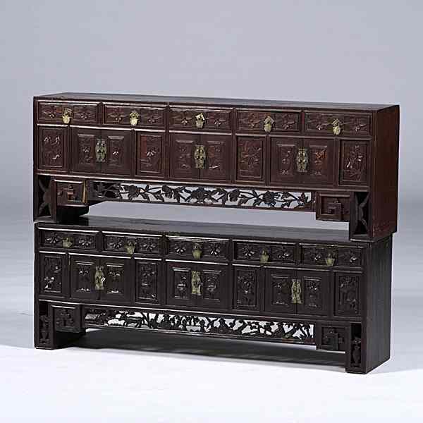 Appraisal: Chinese Chests Chinese A pair of carved chests in red