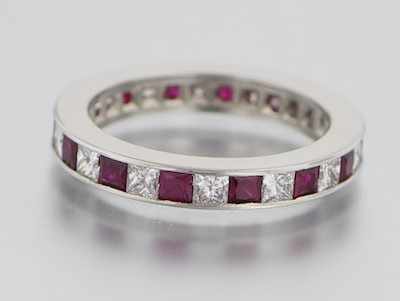 Appraisal: A Platinum Diamond and Ruby Eternity Band Platinum eternity band