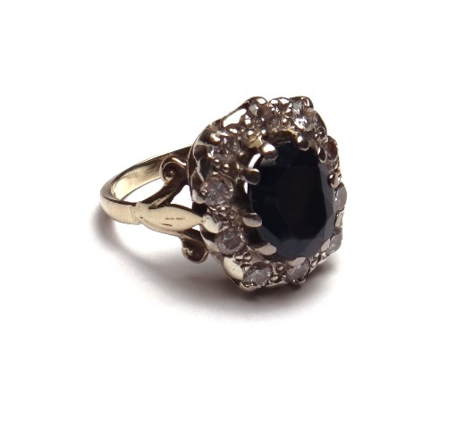 Appraisal: A ct gold sapphire and diamond set cluster ring claw