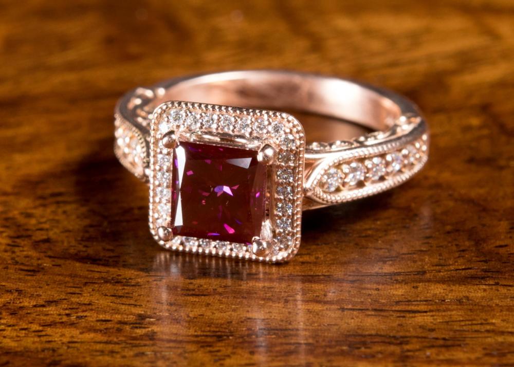 Appraisal: PURPLISH RED DIAMOND AND FOURTEEN KARAT GOLD RING The k