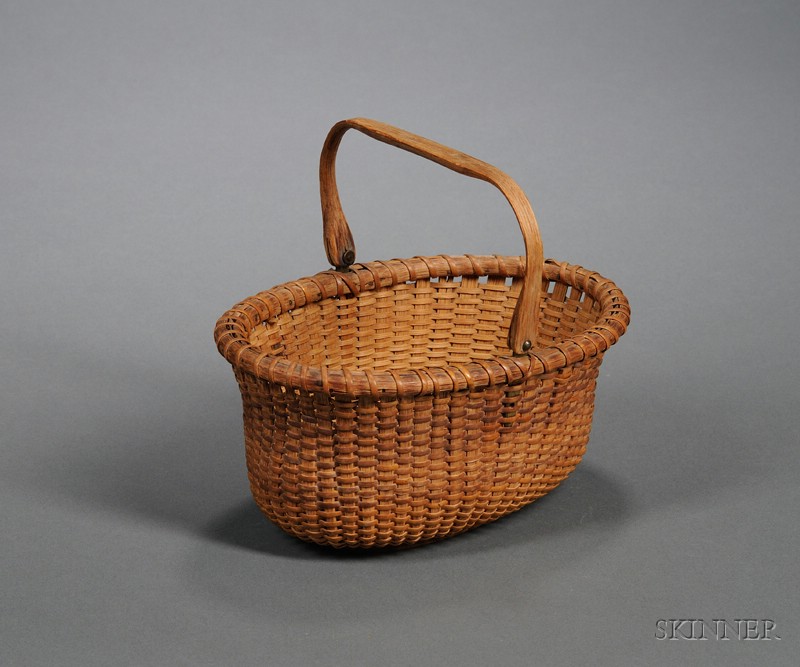 Appraisal: Small Oval Nantucket Basket with Swing Handle ht to rim