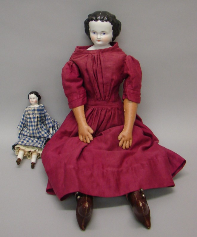 Appraisal: Pair of s china dolls with black hair and blue