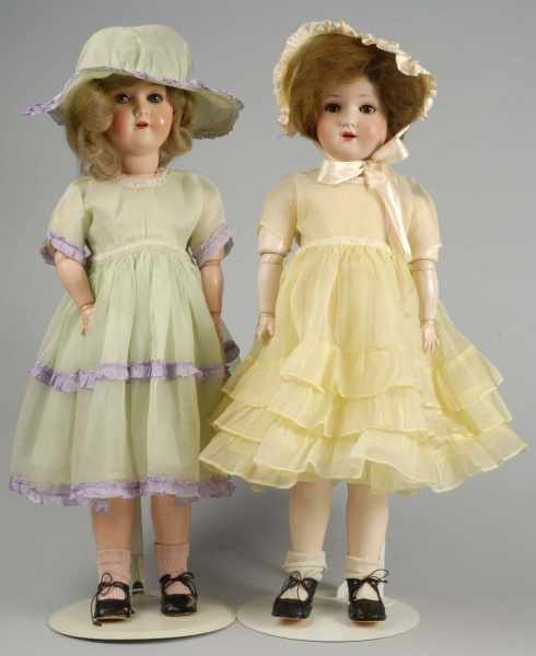 Appraisal: Lot of Darling All Original Bisque Doll Twins Description Painted