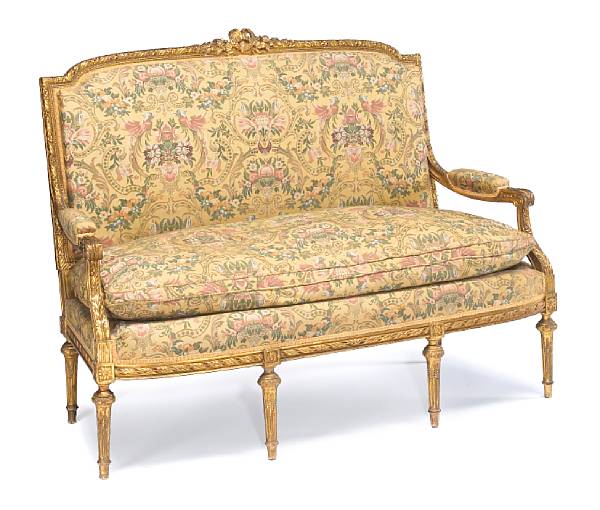 Appraisal: A Louis XVI style giltwood suite of seat furniture early