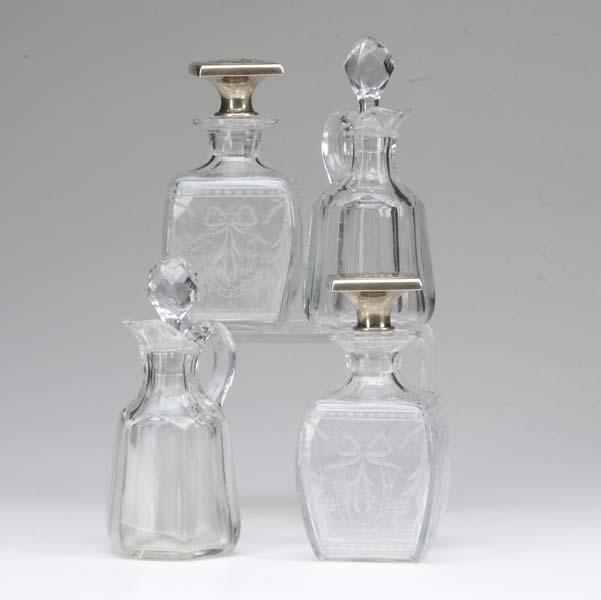 Appraisal: GLASS PERFUME BOTTLES CRUETS Four pieces pair of square cut-glass