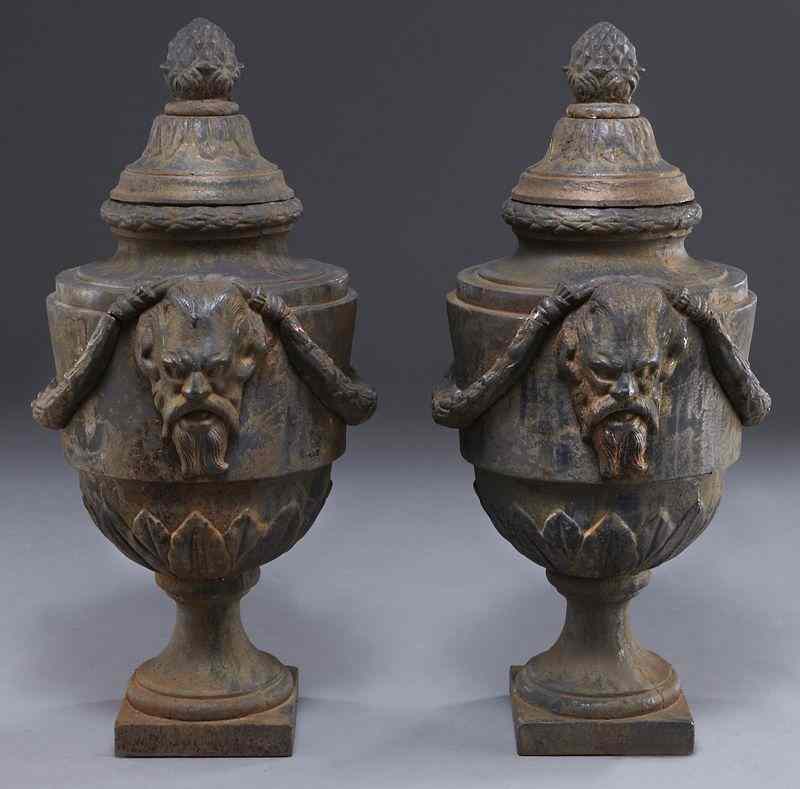 Appraisal: Pr French cast iron lidded garden urns the lids with