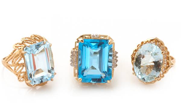 Appraisal: A collection of eight topaz aquamarine gem-set and gold rings