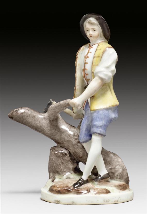 Appraisal: MINIATURE FIGURE OF A WOODCUTTER AS AN ALLEGORY OF 'JANUARY'