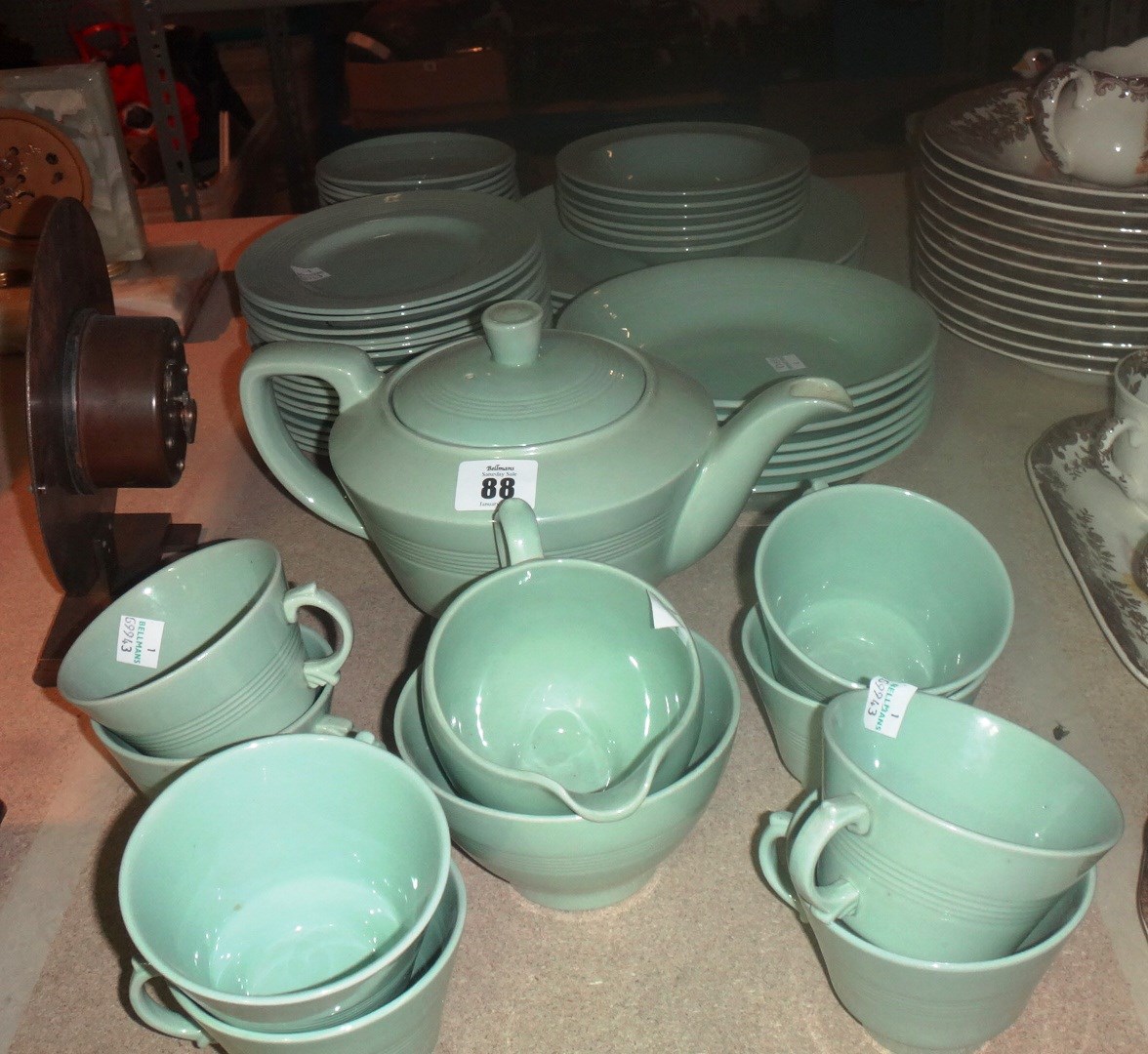 Appraisal: Woods Ware green pottery part service and a pheasant butter