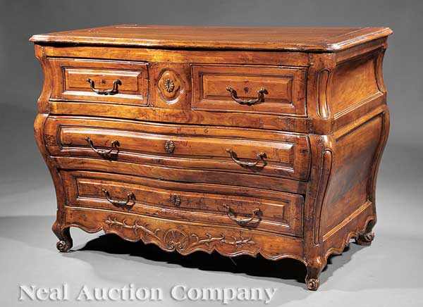 Appraisal: A Louis XV Carved Walnut Bomb Commode c serpentine top