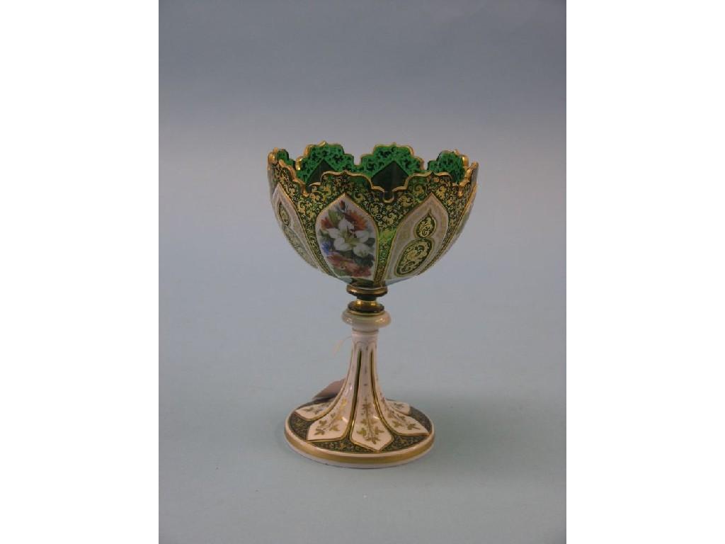 Appraisal: A th century Bohemian overlaid green glass pedestal bowl elaborately