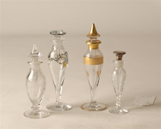 Appraisal: Four Perfume Bottles etched one with sterling stopper the other