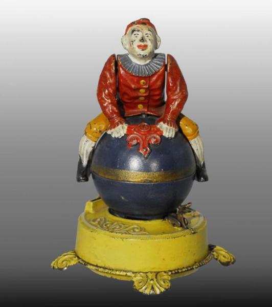 Appraisal: Cast Iron Clown on Globe Mechanical Bank Description Manufactured by