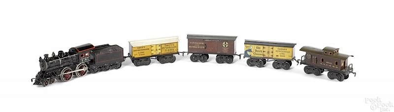 Appraisal: Bing six piece cast iron clockwork freight train Bing six