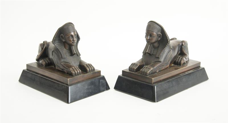 Appraisal: PAIR OF BRONZE AND BELGIAN BLACK MARBLE MODELS OF THE