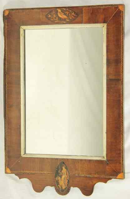 Appraisal: A small wall mirror the frame inlaid with birds and