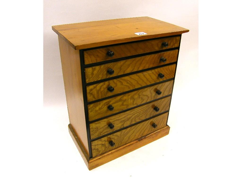 Appraisal: Small wooden compartmentalised collector's cabinet with six graduated drawers upon