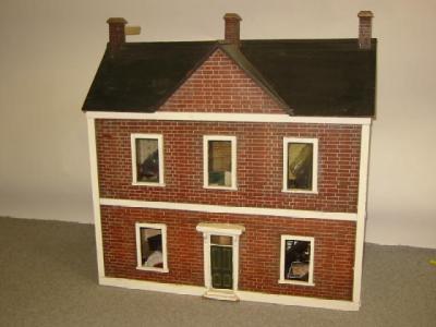 Appraisal: A painted wood doll's house scratch built with pitched and