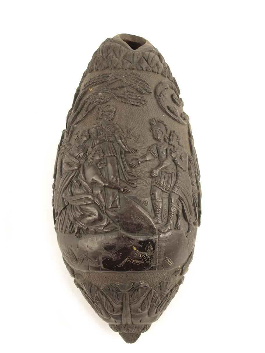 Appraisal: A carved coconut bugbear flask