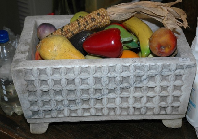 Appraisal: A CHINESE MARBLE TROUGH Carved with a wicker pattern Width