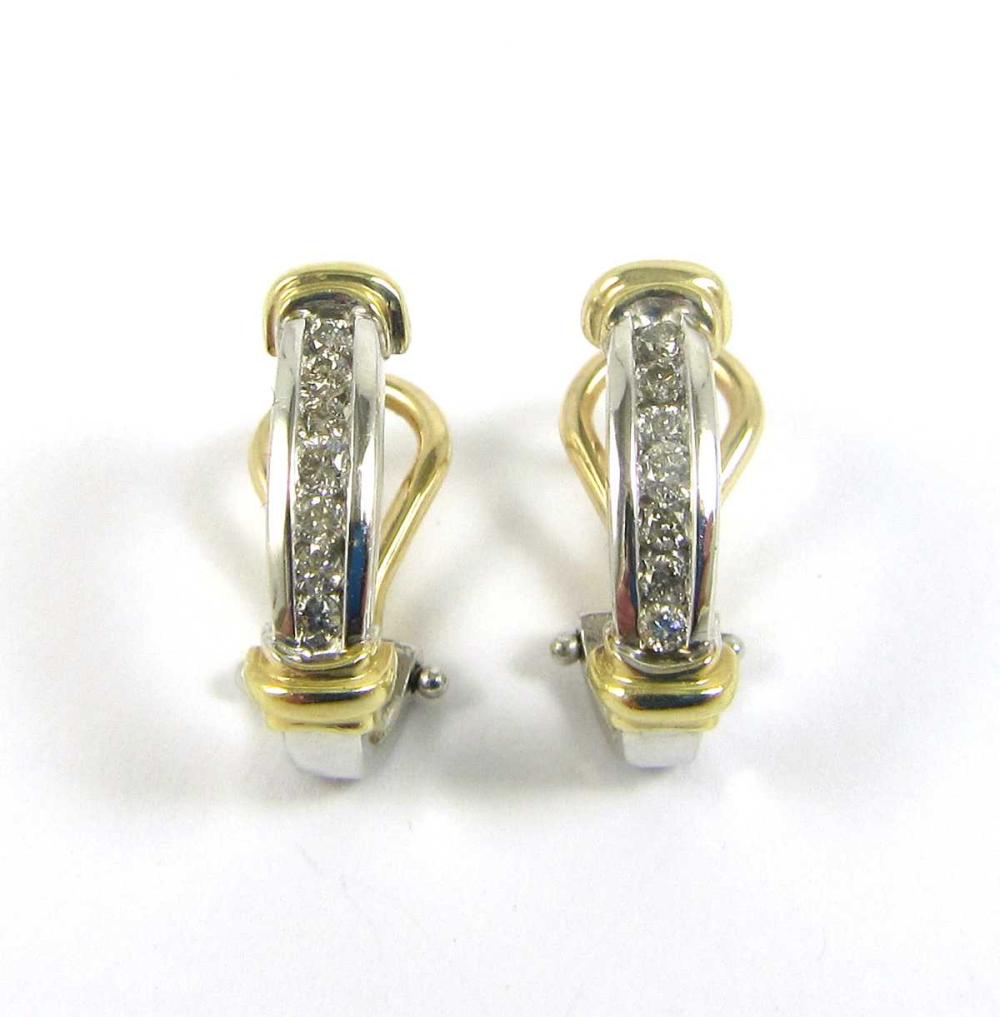 Appraisal: PAIR OF DIAMOND AND FOURTEEN KARAT GOLD EARRINGS each white