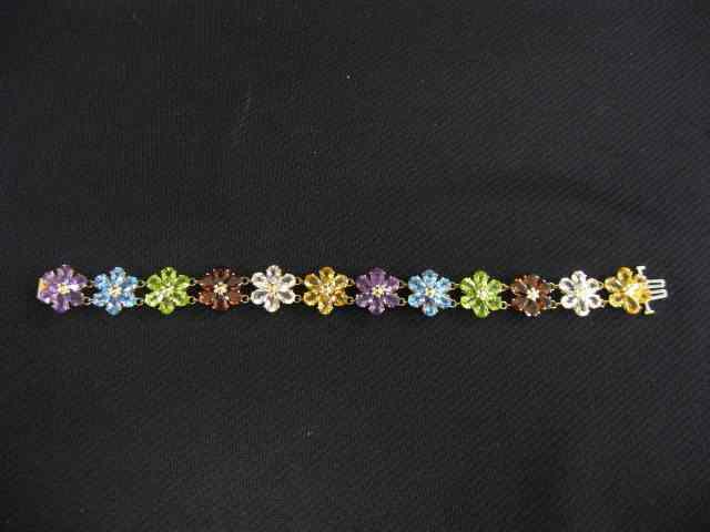 Appraisal: k Gemstone Bracelet carats of gems including garnets peridot amethyst