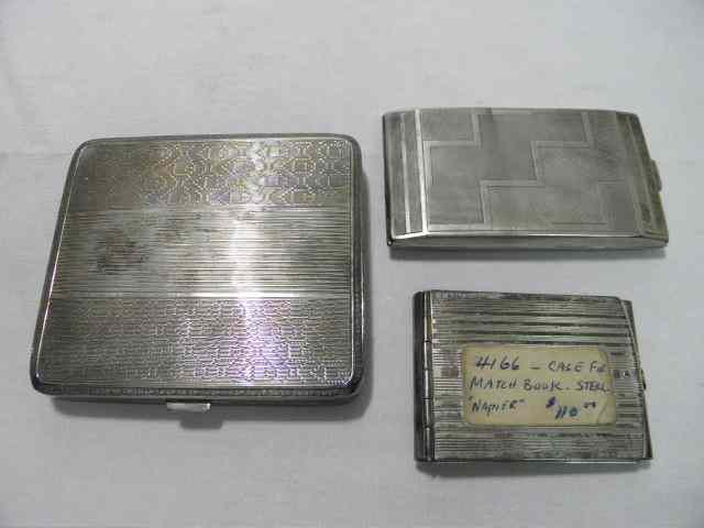 Appraisal: Two silver cigarette cases a sterling matchbook case Includes one