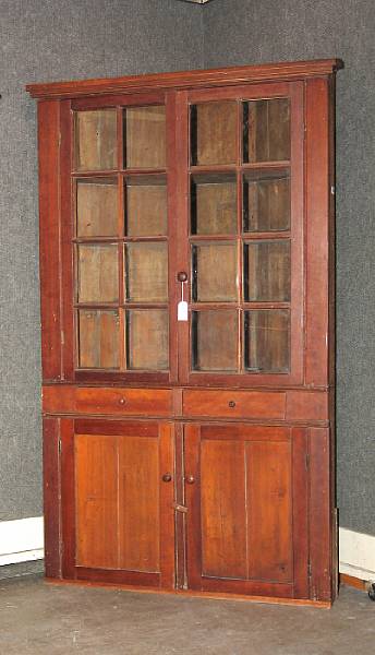 Appraisal: A late Federal cherrywood corner cupboard probably Pennsylvania first quarter