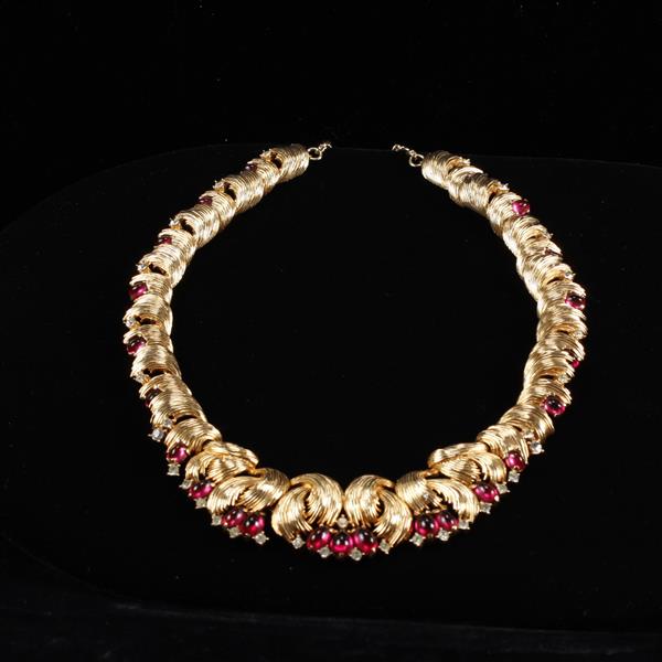 Appraisal: Boucher ruby red poured glass jelly and rhinestone studded choker