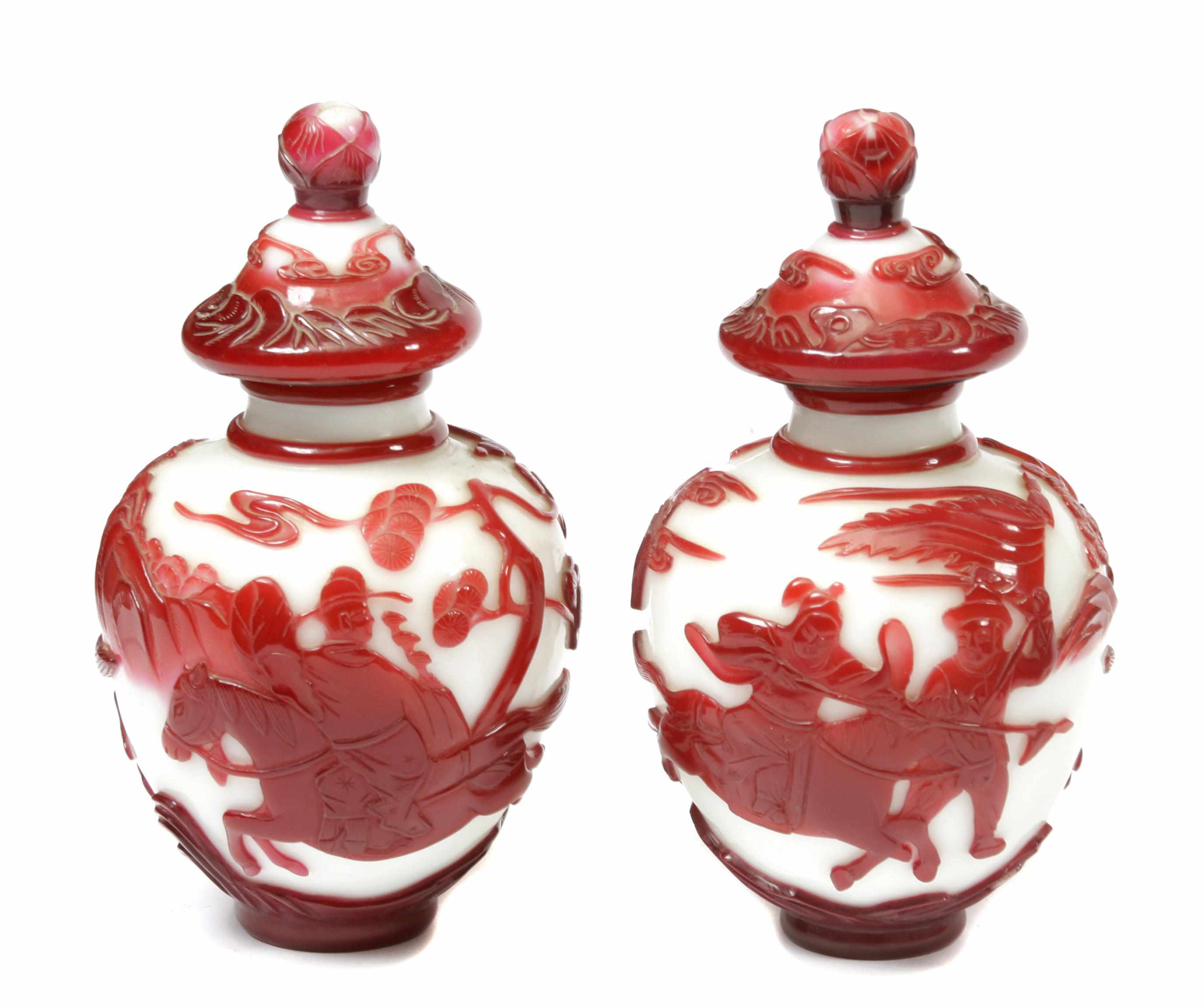 Appraisal: A pair of red and white Peking glass covered vases