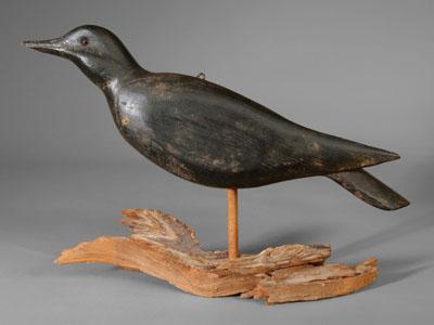 Appraisal: Crow decoy carved and laminated wood with black paint glass