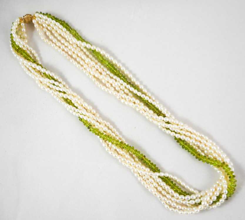 Appraisal: PERIDOT AND PEARL MULTI STRAND NECKLACE measuring inches in length