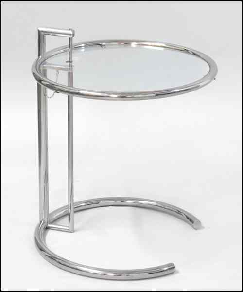 Appraisal: EILEEN GRAY CHROME AND TEMPERED GLASS SIDE TABLE Adjustable height