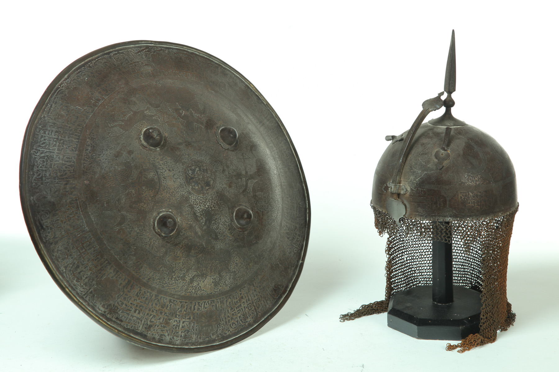 Appraisal: HELMET AND SHIELD Persian th century or earlier Decorated spiked