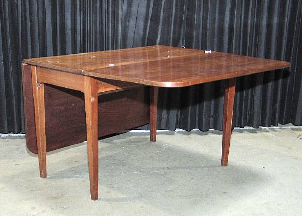 Appraisal: A George III mahogany drop leaf table late th century