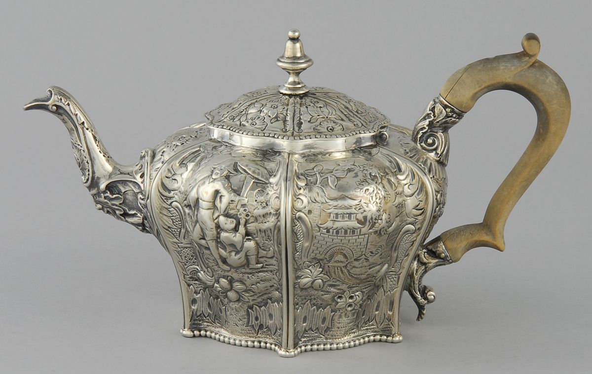 Appraisal: CHINESE EXPORT SILVER TEAPOT th CenturyIn squat paneled form with