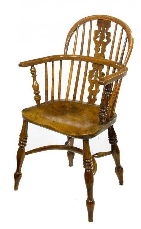 Appraisal: A VICTORIAN YEW-WOOD WINDSOR CHAIR with fretted splat and baluster