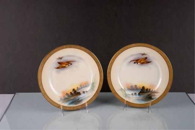 Appraisal: Two Limoges Game Plates Flying quail heavy gilt rim Marked